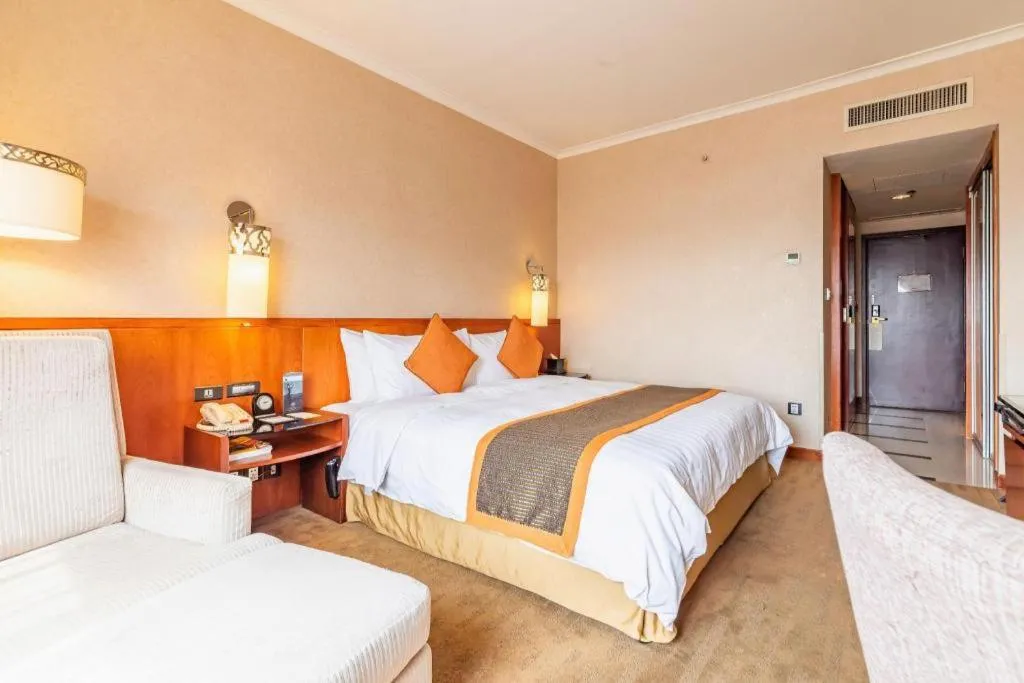 Bed in Xian Grand Noble Hotel