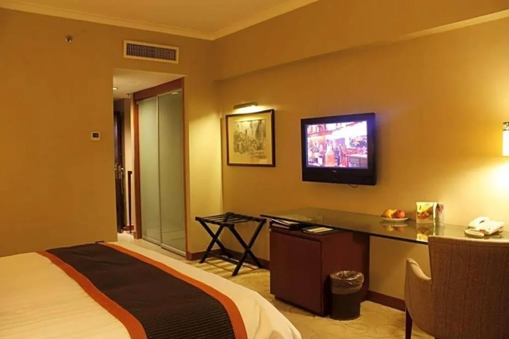 Bed in Xian Grand Noble Hotel