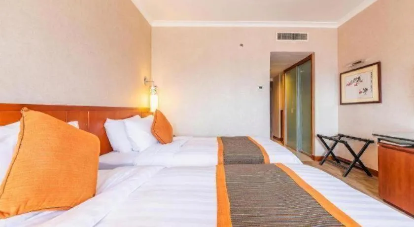 Bed in Xian Grand Noble Hotel