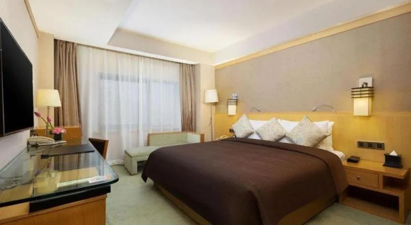 Bed in Xian Grand Noble Hotel