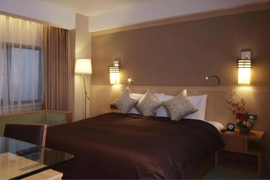 Bed in Xian Grand Noble Hotel