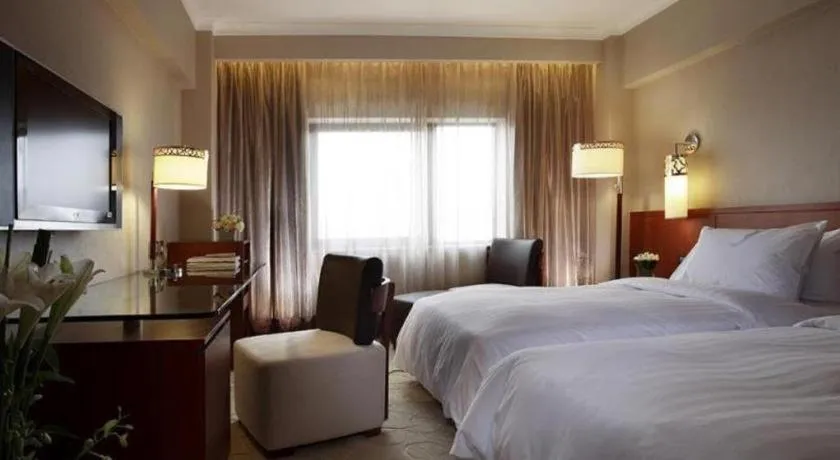 Bed in Xian Grand Noble Hotel