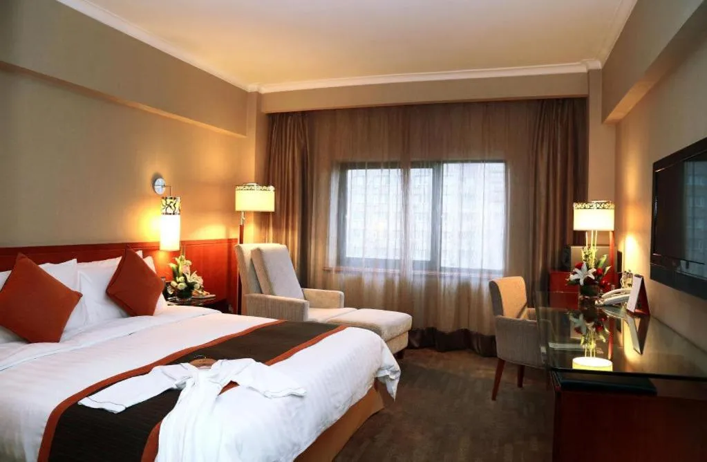 Bed in Xian Grand Noble Hotel