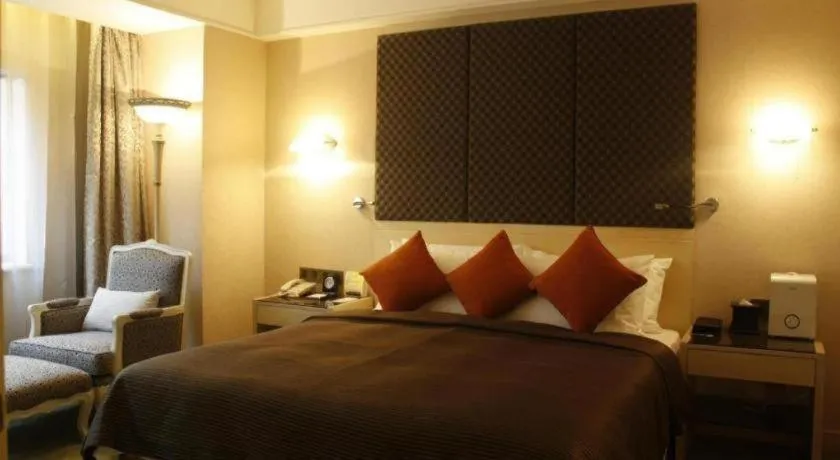 Bed in Xian Grand Noble Hotel