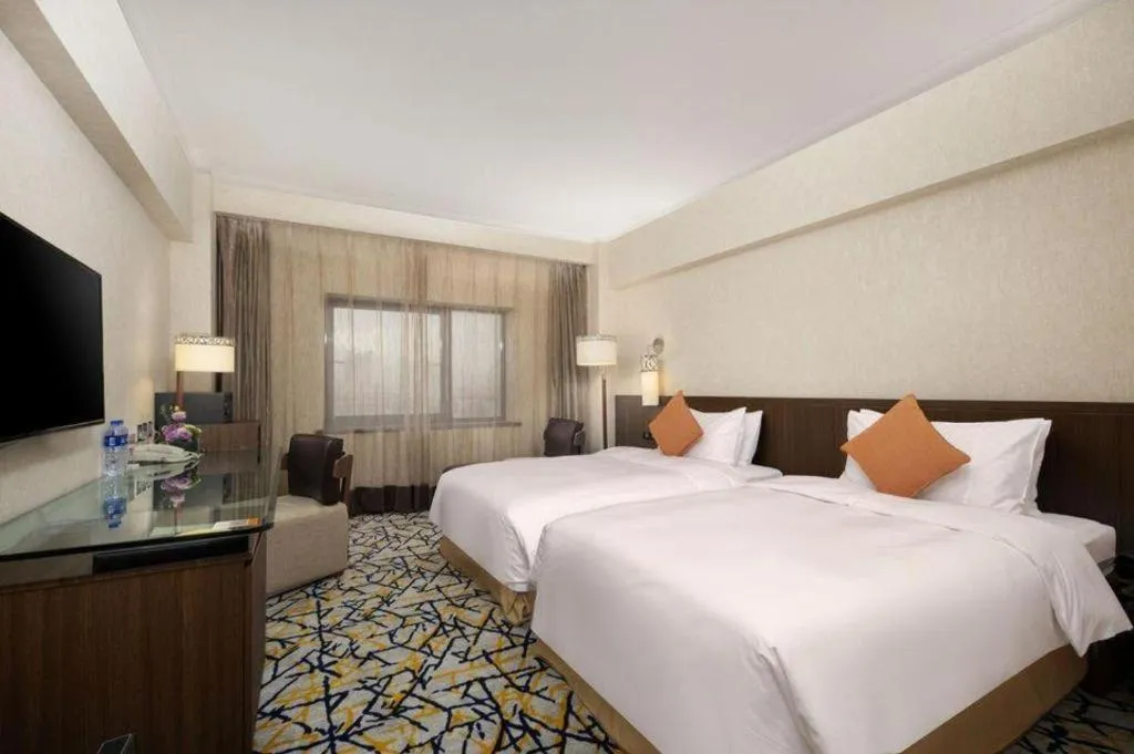 Bed in Xian Grand Noble Hotel