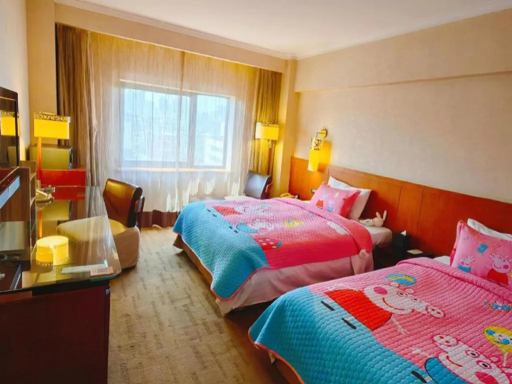 Bed in Xian Grand Noble Hotel