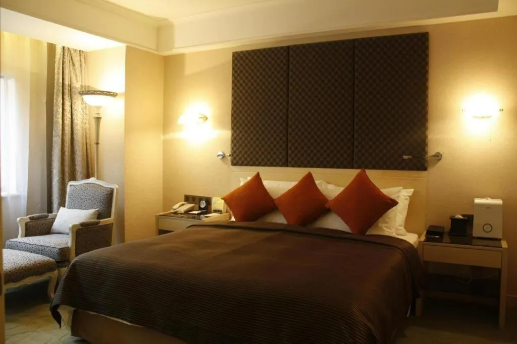 Bed in Xian Grand Noble Hotel