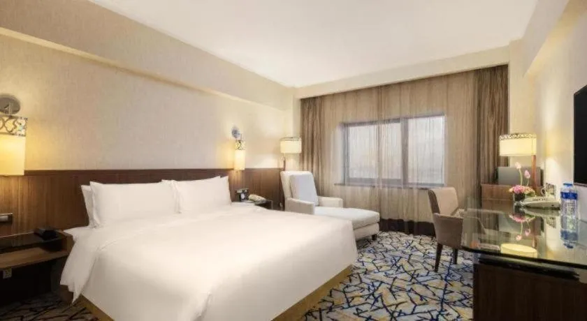 Bed in Xian Grand Noble Hotel