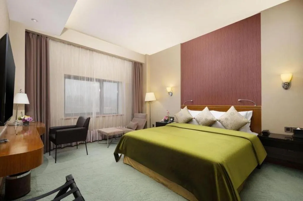 Bed in Xian Grand Noble Hotel