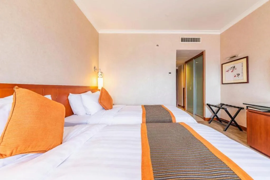 Bed in Xian Grand Noble Hotel