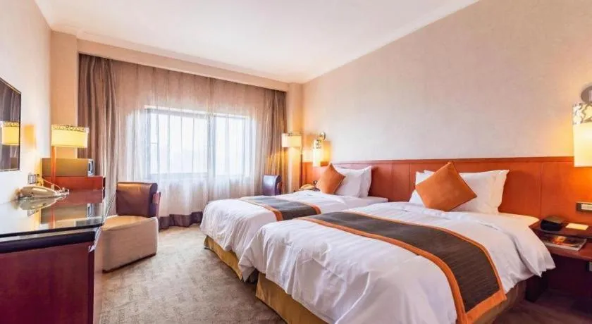 Bed in Xian Grand Noble Hotel