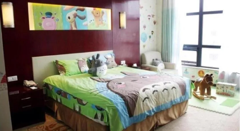 Bed in New Century Hotel Zaozhuang Fengming