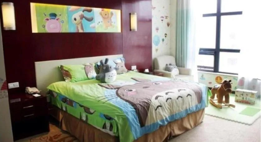 Bed in New Century Hotel Zaozhuang Fengming