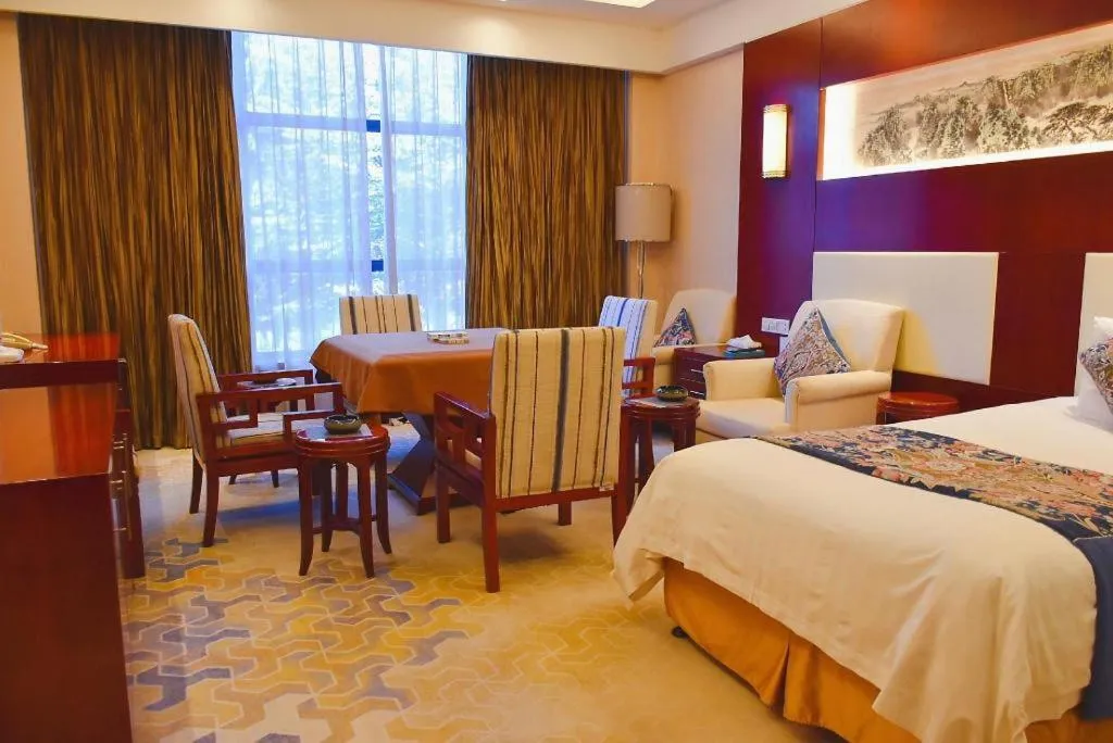 Bed in New Century Hotel Zaozhuang Fengming