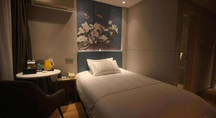 Bed in Magnotel Business Xuzhou Jinying Sudi Road Metro Station