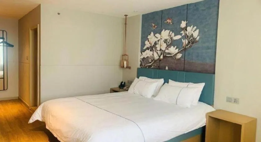 Bed in Magnotel Business Xuzhou Jinying Sudi Road Metro Station
