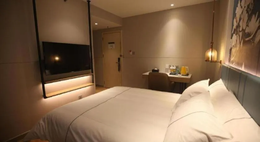 Bed in Magnotel Business Xuzhou Jinying Sudi Road Metro Station