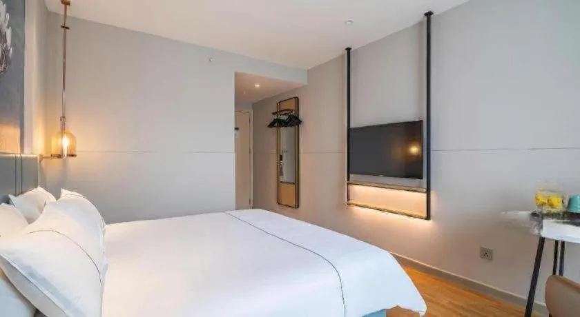 Bed in Magnotel Business Xuzhou Jinying Sudi Road Metro Station