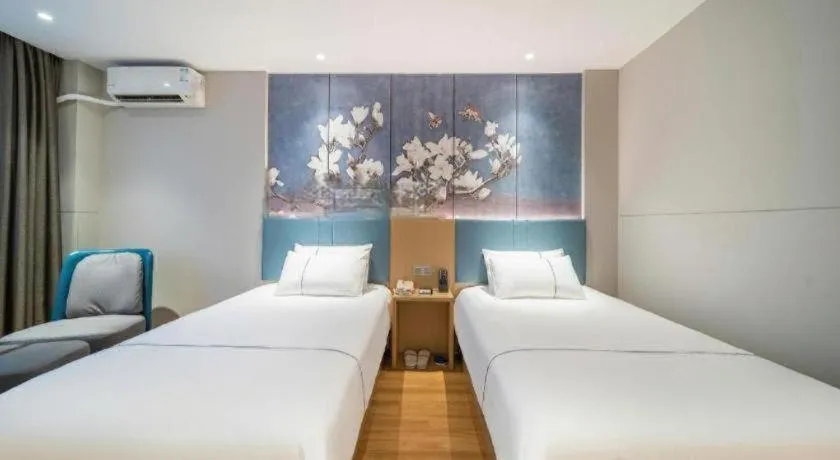 Bed in Magnotel Business Xuzhou Jinying Sudi Road Metro Station