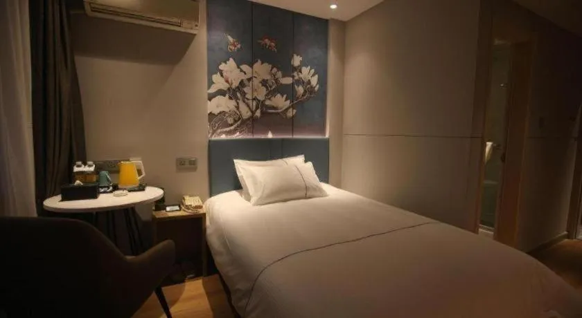 Bed in Magnotel Business Xuzhou Jinying Sudi Road Metro Station