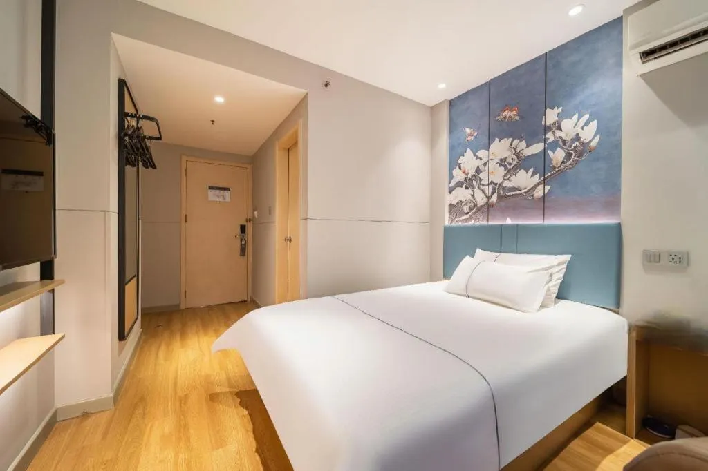 Bed in Magnotel Business Xuzhou Jinying Sudi Road Metro Station