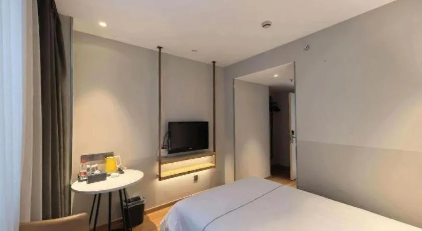 Bed in Magnotel Business Xuzhou Jinying Sudi Road Metro Station