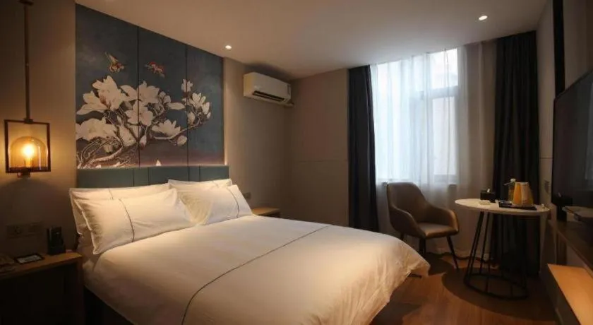 Bed in Magnotel Business Xuzhou Jinying Sudi Road Metro Station