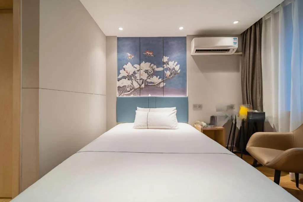 Bed in Magnotel Business Xuzhou Jinying Sudi Road Metro Station