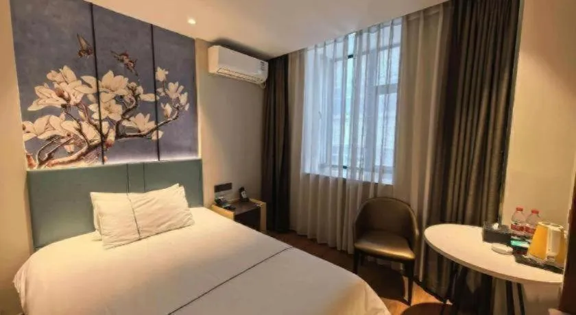 Bed in Magnotel Business Xuzhou Jinying Sudi Road Metro Station