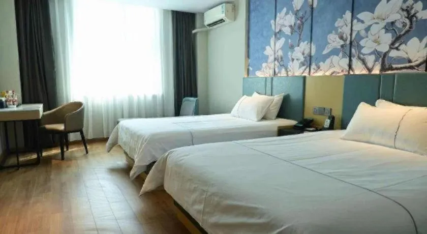 Bed in Magnotel Business Xuzhou Jinying Sudi Road Metro Station