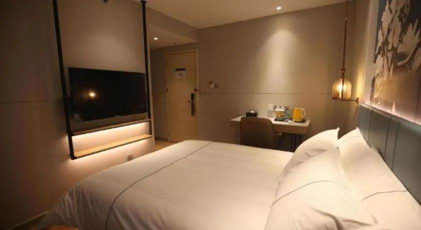 Bed in Magnotel Business Xuzhou Jinying Sudi Road Metro Station