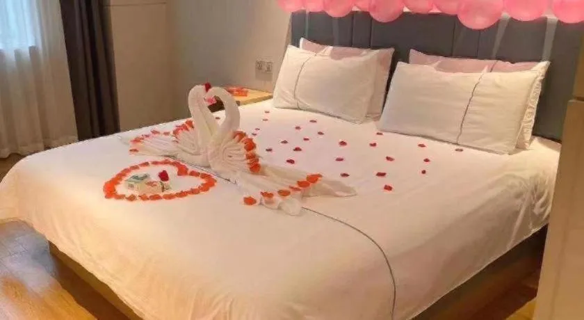 Bed in Magnotel Business Xuzhou Jinying Sudi Road Metro Station