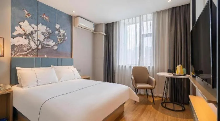 Bed in Magnotel Business Xuzhou Jinying Sudi Road Metro Station