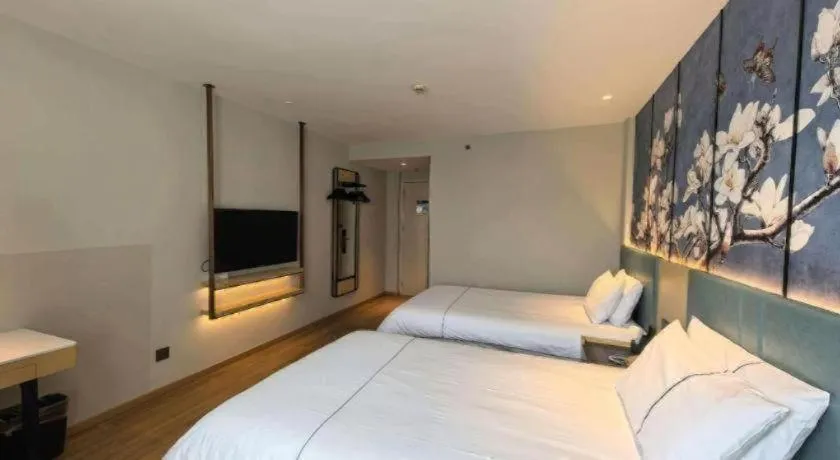 Bed in Magnotel Business Xuzhou Jinying Sudi Road Metro Station