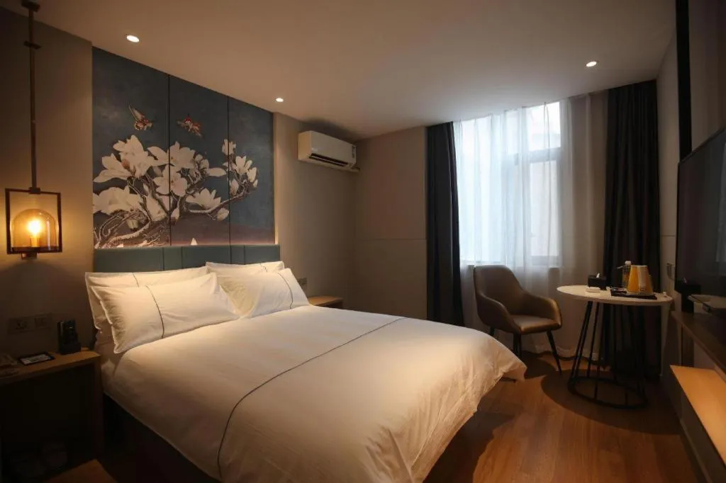 Bed in Magnotel Business Xuzhou Jinying Sudi Road Metro Station