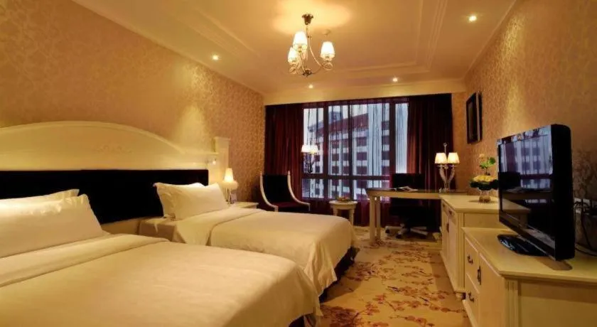 Bed in Guilin Bravo Hotel Grand Wing