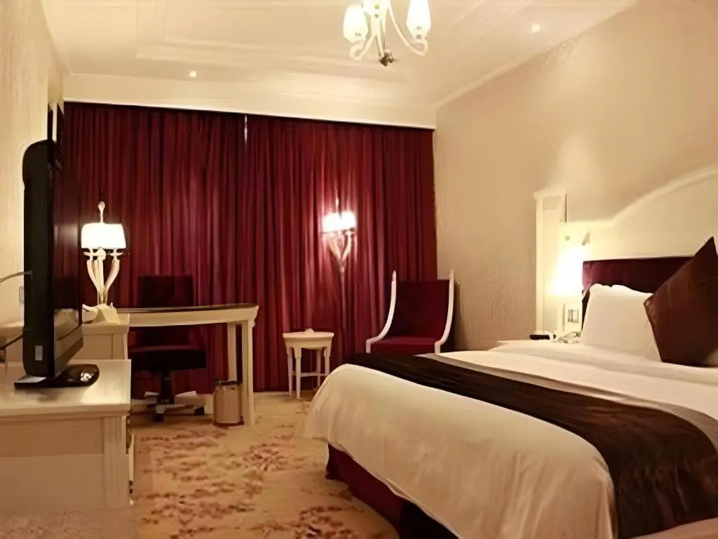 Bed in Guilin Bravo Hotel Grand Wing