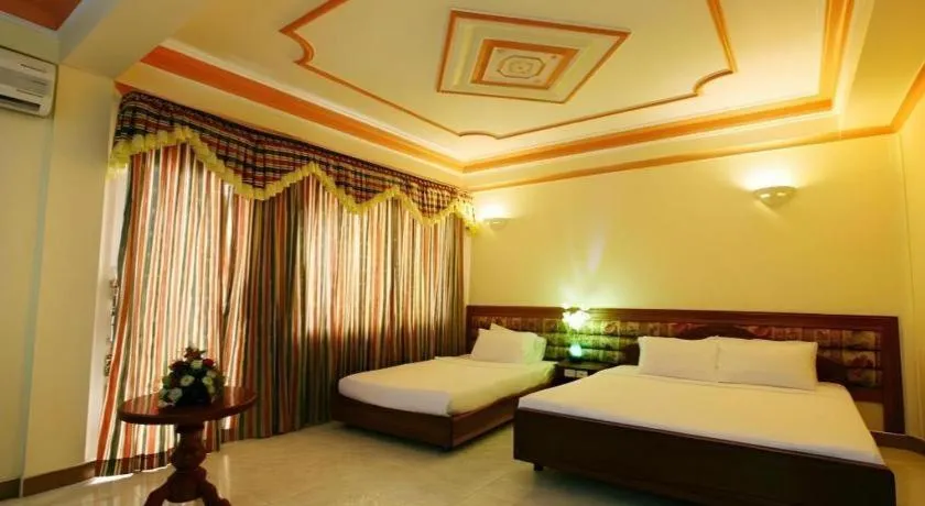 Bed in Lucky Star Hotel