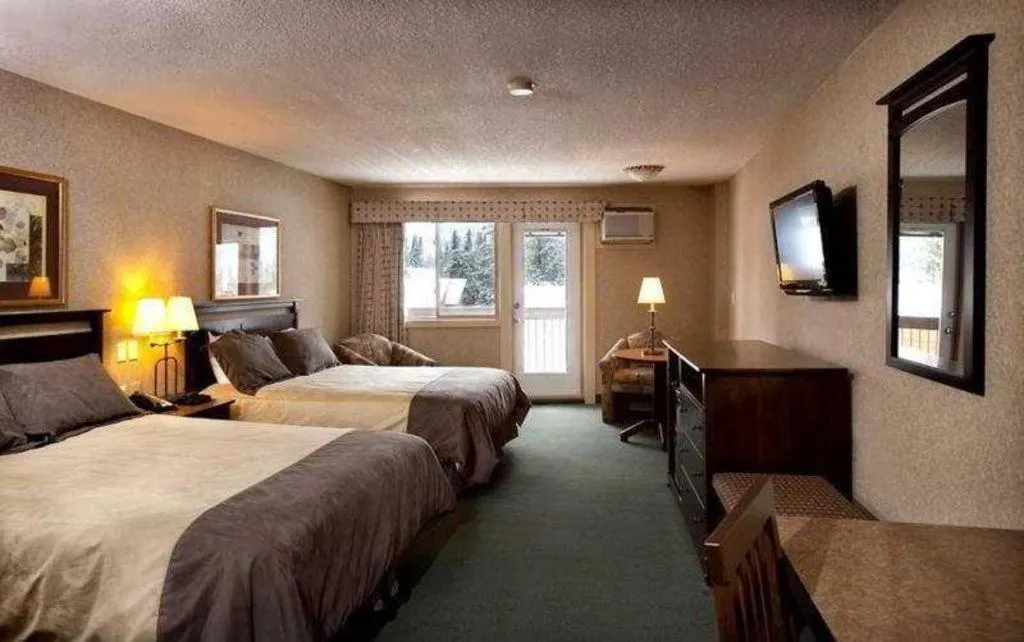 Bed in Coast High Country Inn