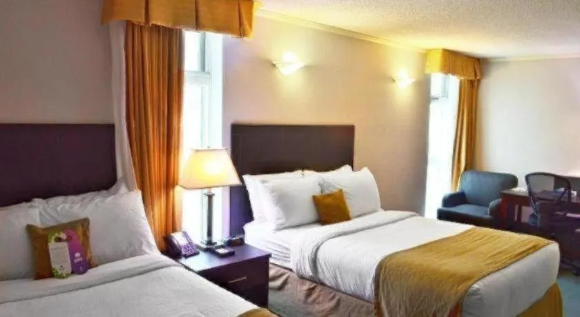 Bed in Coast High Country Inn