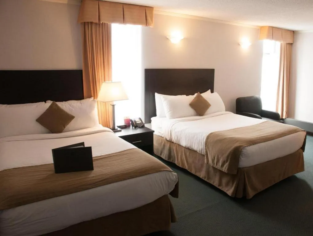 Bed in Coast High Country Inn