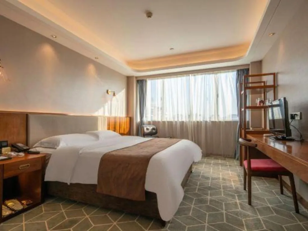 Bed in Guilin Plaza Hotel