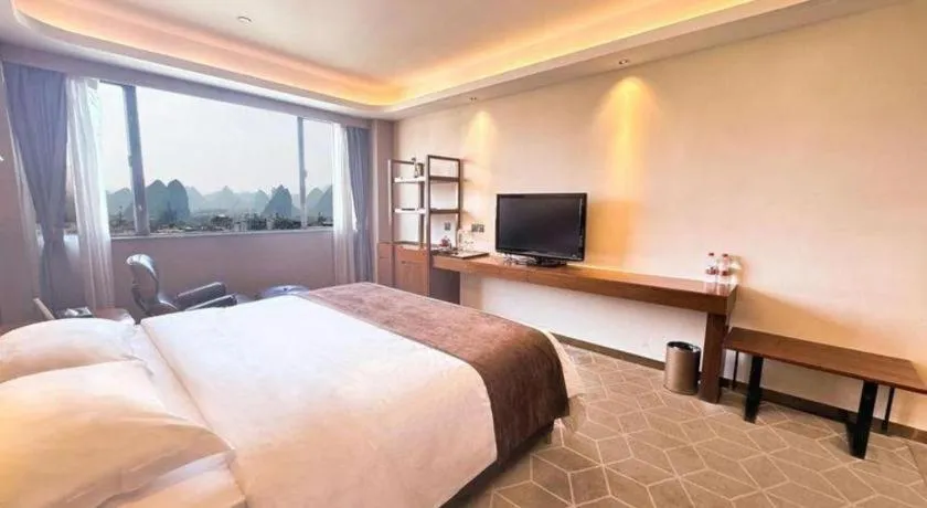 Bed in Guilin Plaza Hotel