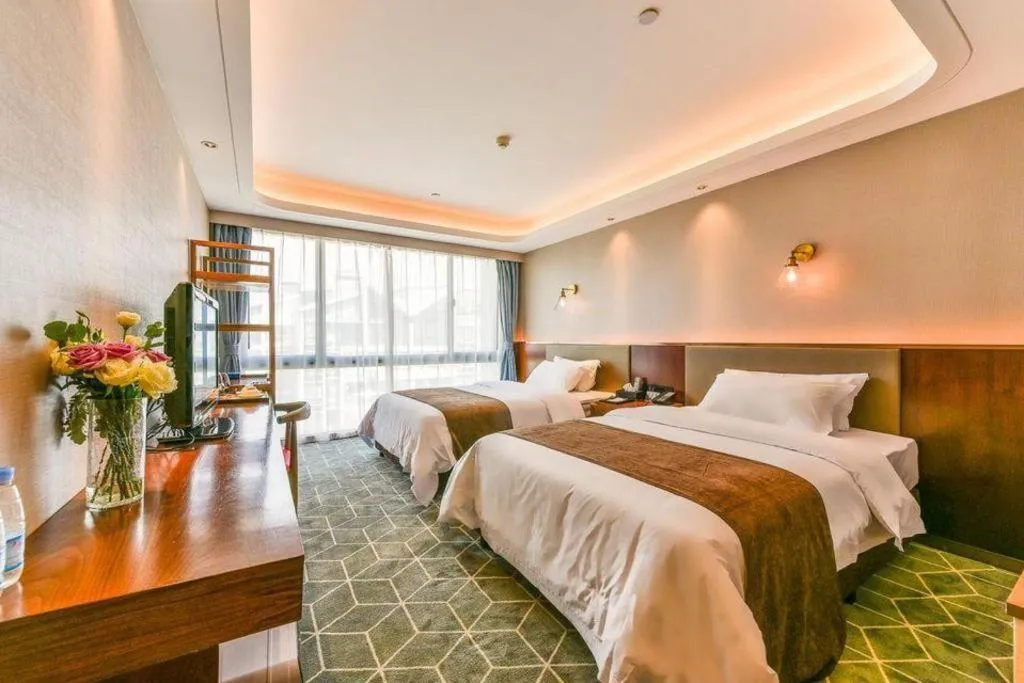 Bed in Guilin Plaza Hotel
