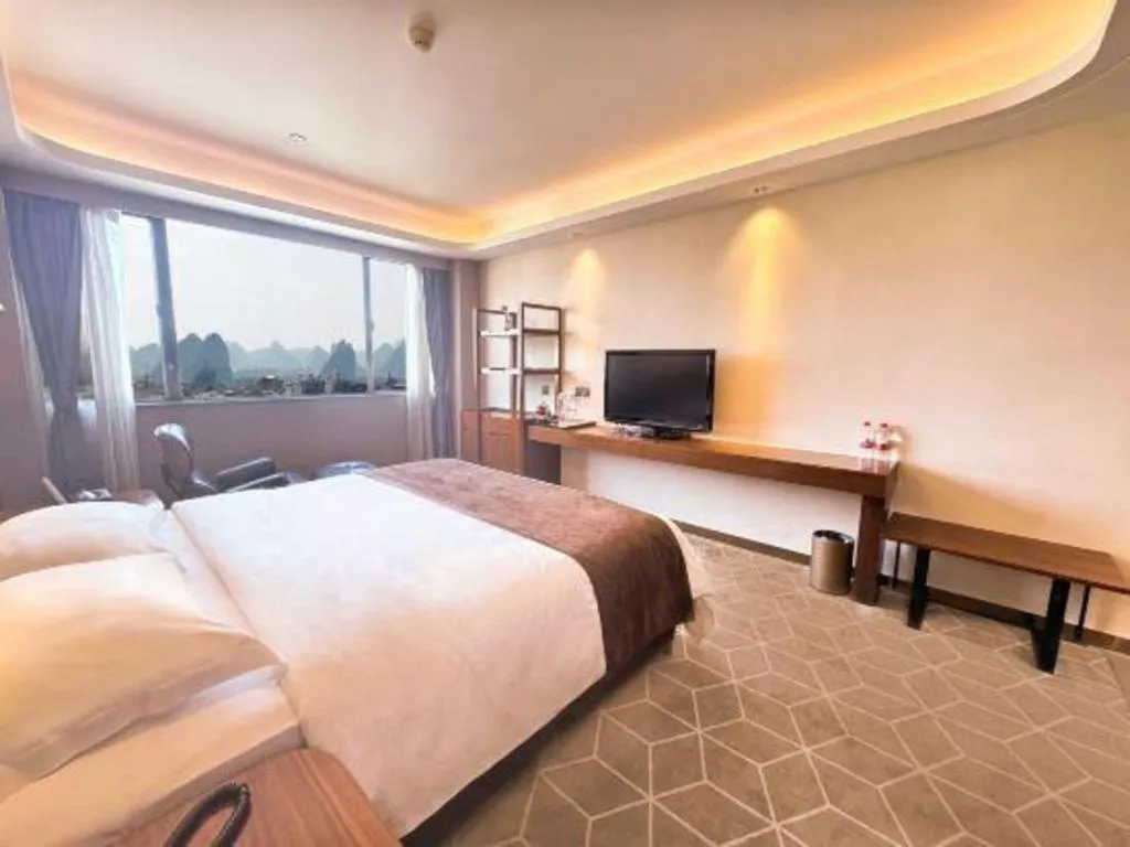 Bed in Guilin Plaza Hotel