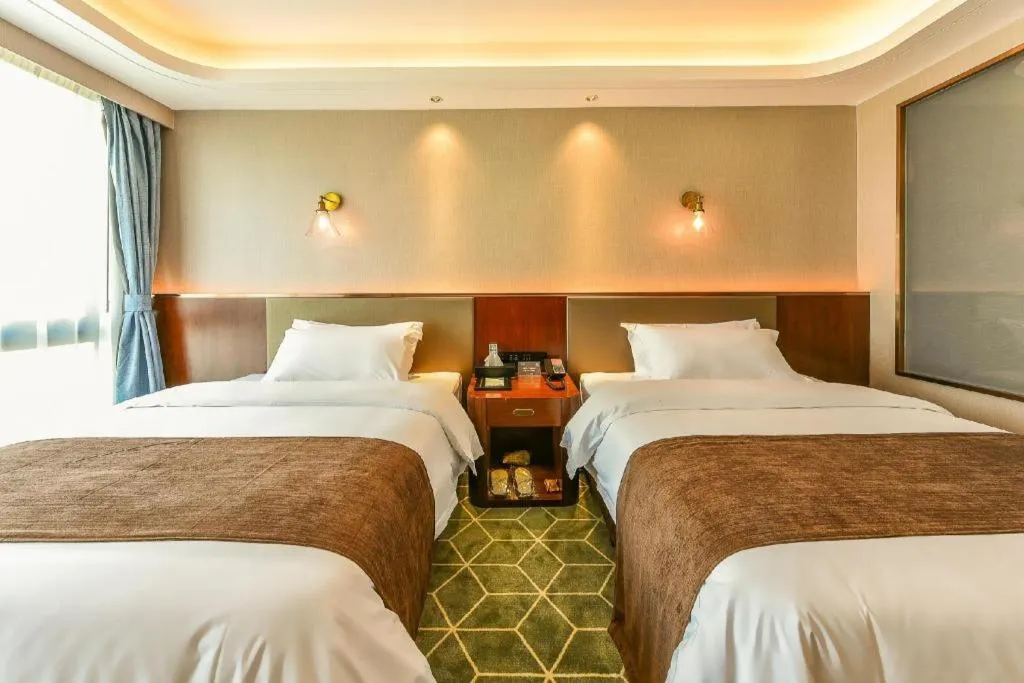 Bed in Guilin Plaza Hotel