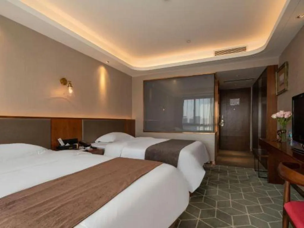 Bed in Guilin Plaza Hotel