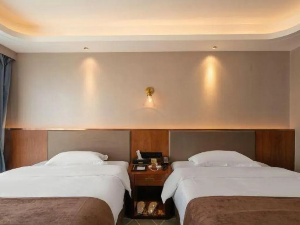 Bed in Guilin Plaza Hotel