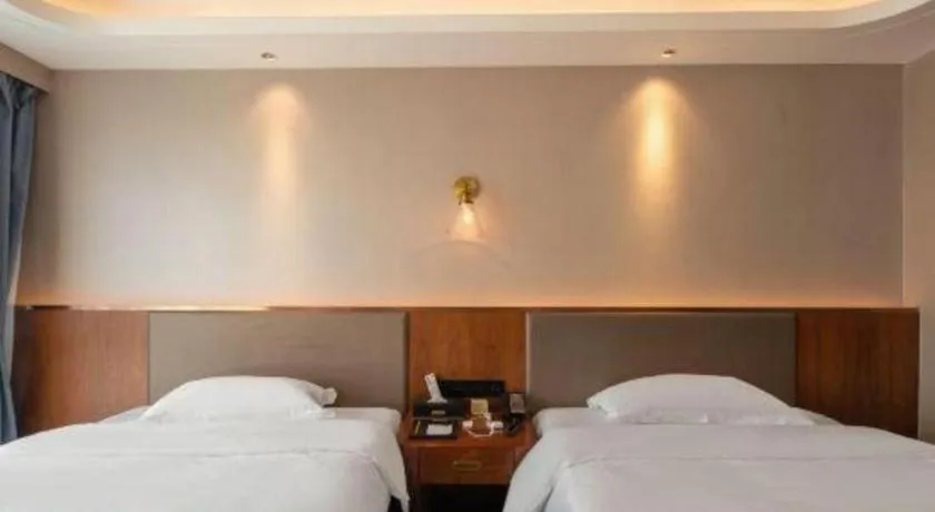 Bed in Guilin Plaza Hotel