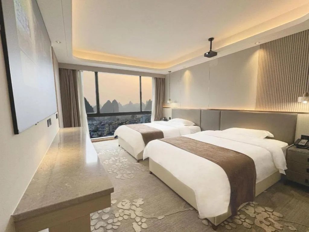 Bed in Guilin Plaza Hotel